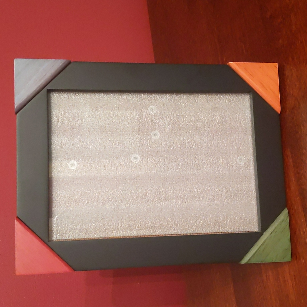Black Frame with Multi Color Accents